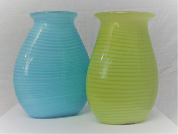 A Rare Pair  Tiffany Art Glass Vases  7 ½” h x 6” w  $750  Both vases are signed by the artist Jamie Harris for Tiffany and Co.  One is dated 2002 and the other 2003.  It’s rare to find a pair of these stylish vessels, perfect for a bouquet of tulips of just for display.  Harris is a 43-year old glass artist working and living in NYC.  We understand his stint with Tiffany was only for about a year, which makes theses vases even more precious and likely to appreciate in value.